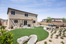 backyard with desert landscaping and seating area