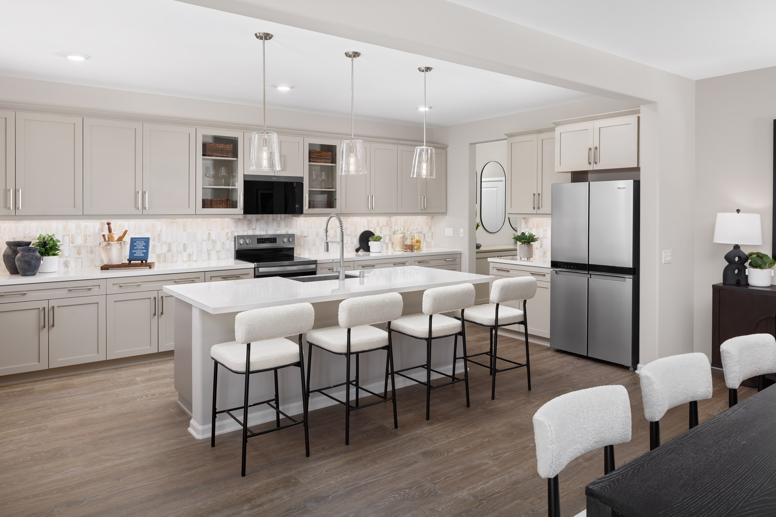 kitchen with neutral cabinets and white countertops