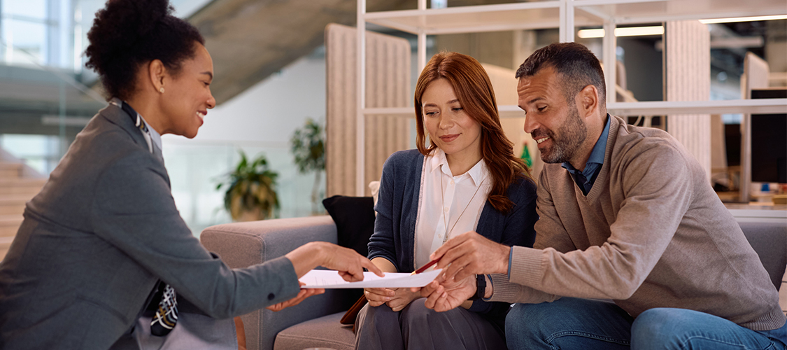 People talking to a loan officer