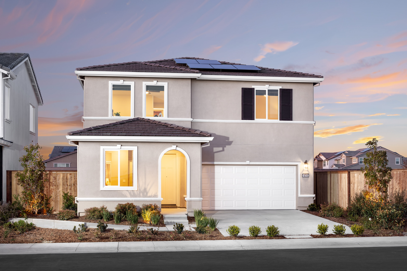 front exterior of two-story mediterranean home