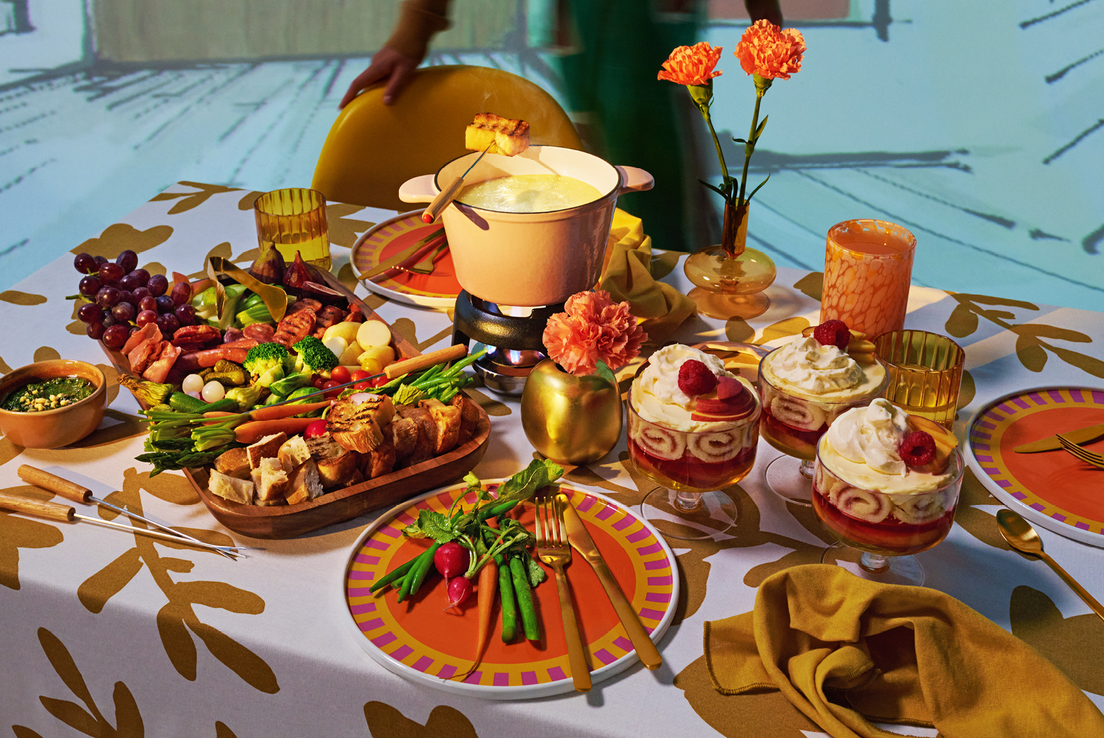 retro table setting, cheese fondue, seasonal vegetables, trifles