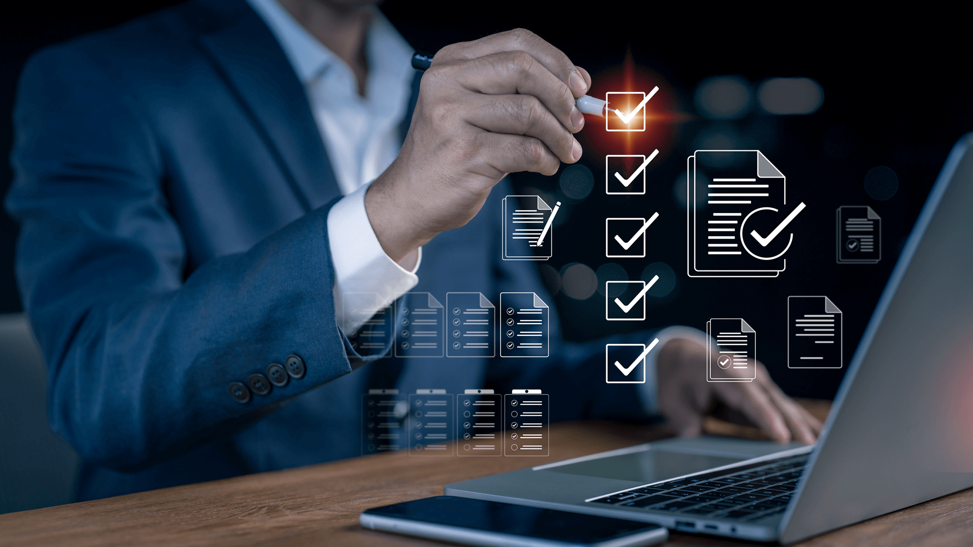 Real-time-Inventory-Promising-In-Page-2.png Abstract image of a man holding a laptop computer screen.