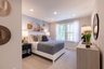 secondary bedroom with a full-sized bed