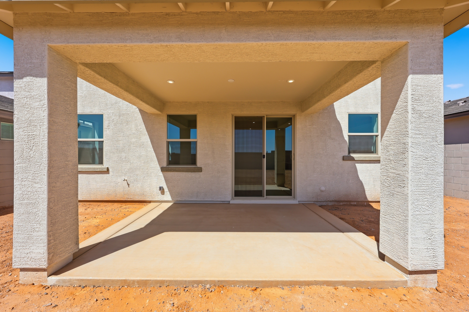 spacious outdoor patio with recessed lights