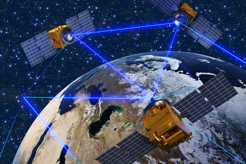 Satellites sending blue laser beams to each other for communication