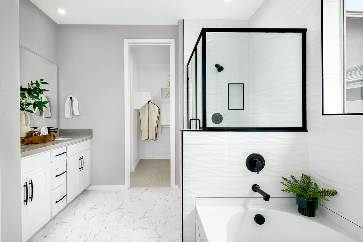 large bathroom with shower and window