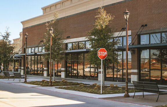Store front of a brick-facade supermarket