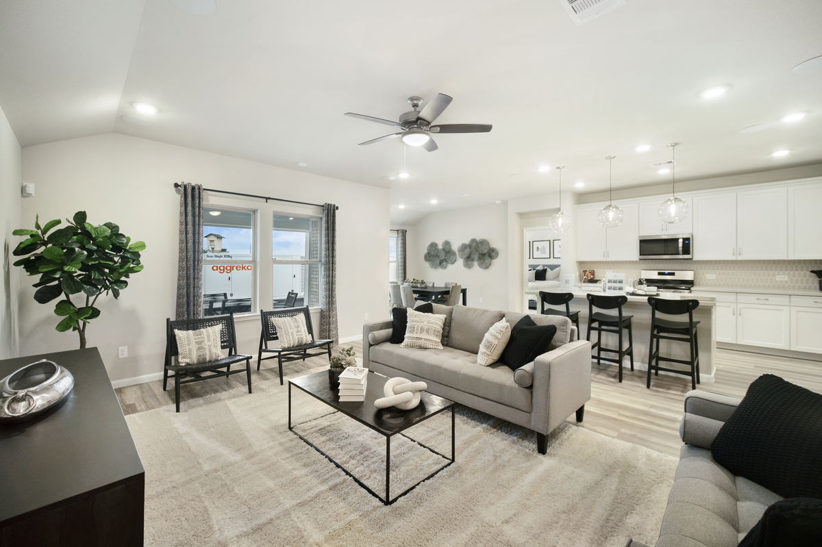 great room with couch and coffee table