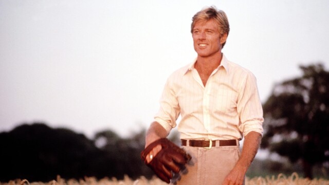 The Natural movie featuring Robert Redford with a baseball mitt in a field