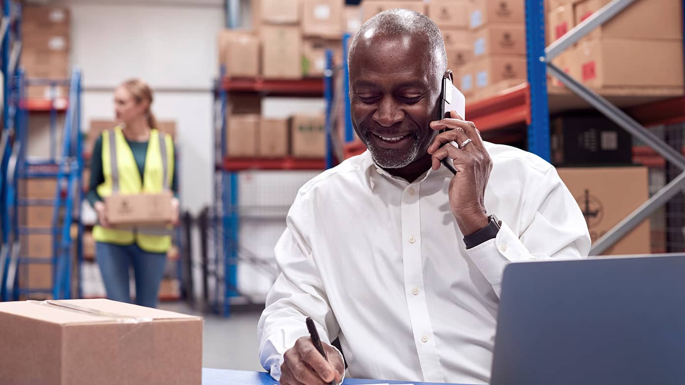 Man using the phone to make an order