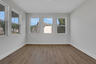 study with french doors and hard surface flooring