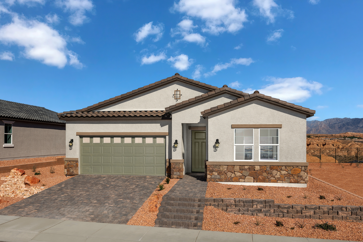 single-story home with desert landscaping
