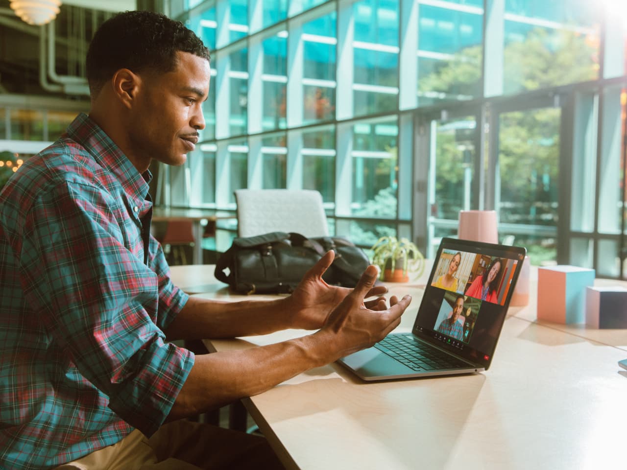 Man sitting at desk on zoom meetings