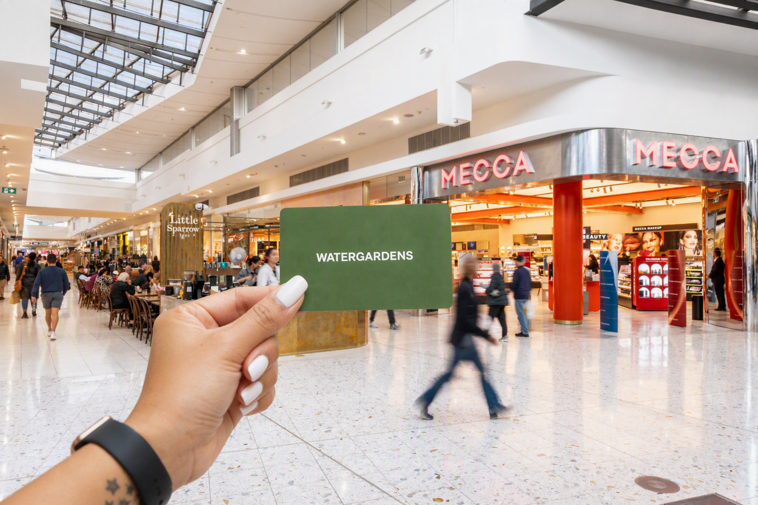 Watergardens gift card outside Mecca store