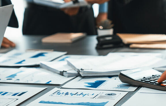 Team working in office and analyzing financial data