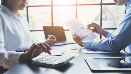 business people meeting to discuss and brainstorming the financial report paperwork in home office