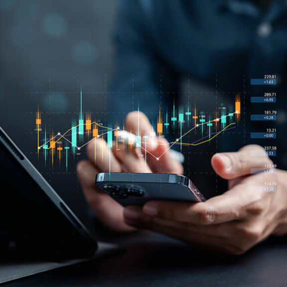 Investor using smartphone to check stock market