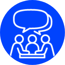 Icon that looks like 3 people around a table all talking, placed in bright blue circle with the icon outlined in white