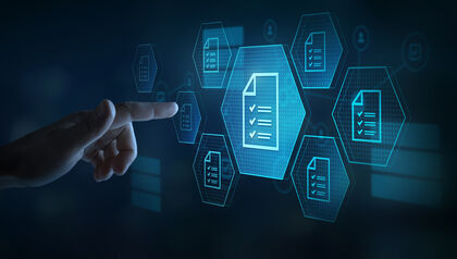 Finger pointing at a screen covered in digital badges