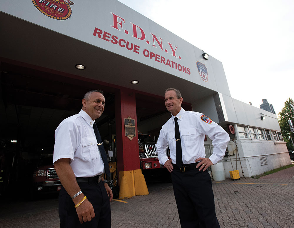 Joe, left, and Chuck Downey stand outside FDNY Special Operations Command in New York City