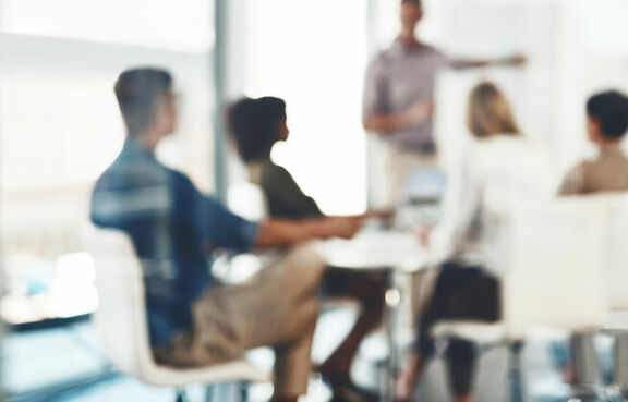 defocused people business meeting talking