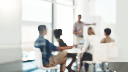 defocused people business meeting talking