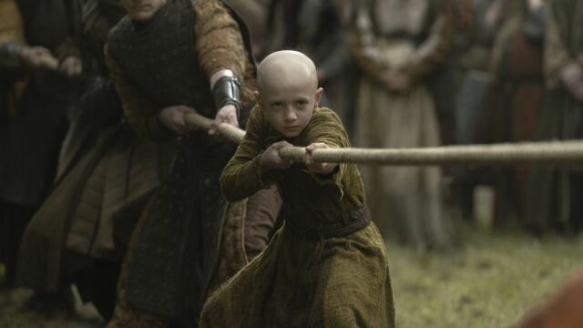 Dexter Sol Ansell as young Prince Aegon Targaryen “Egg,” competing in tug-of-war in HBO’s A Knight of the Seven Kingdoms.