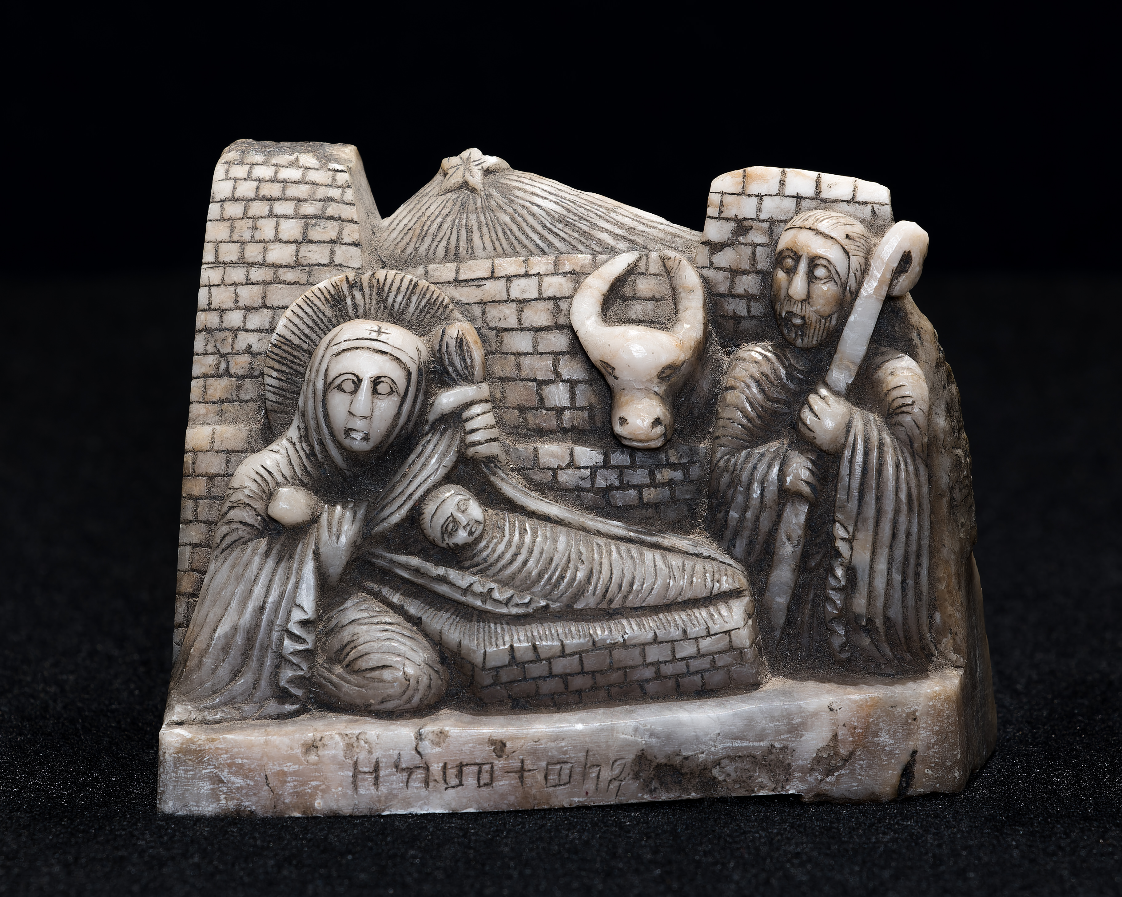 Crèche made in 2011 from North Ethiopia.  Marble carved Nativity depicts Holy Family with ox and star. 