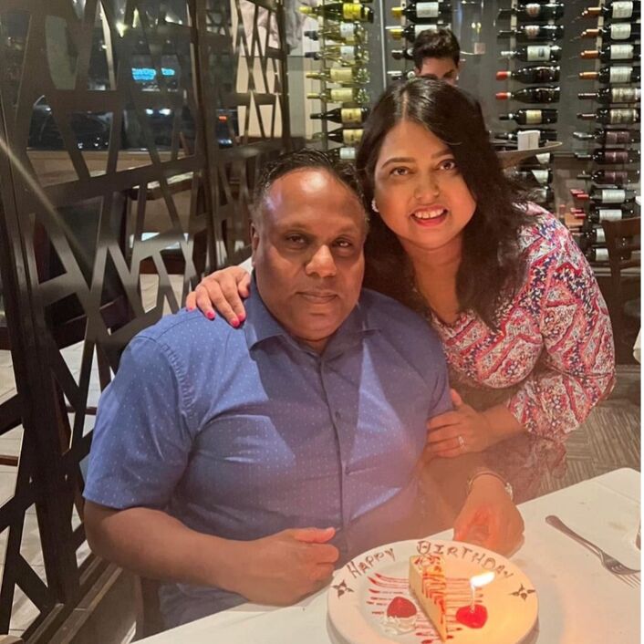 Fatima and her husband, Paul, celebrating his birthday