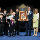 Supreme Knight Kelly poses with the family of the year