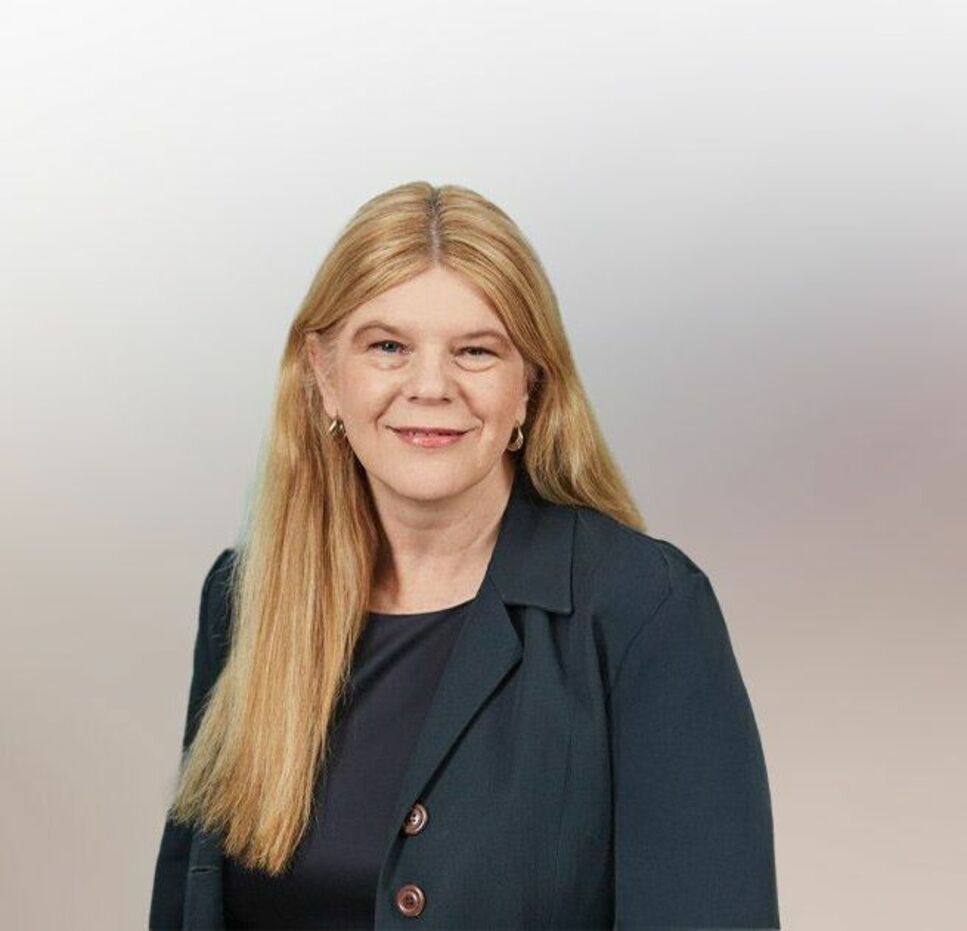 Portrait of Mychelle Curran, State Director at Mission Australia.