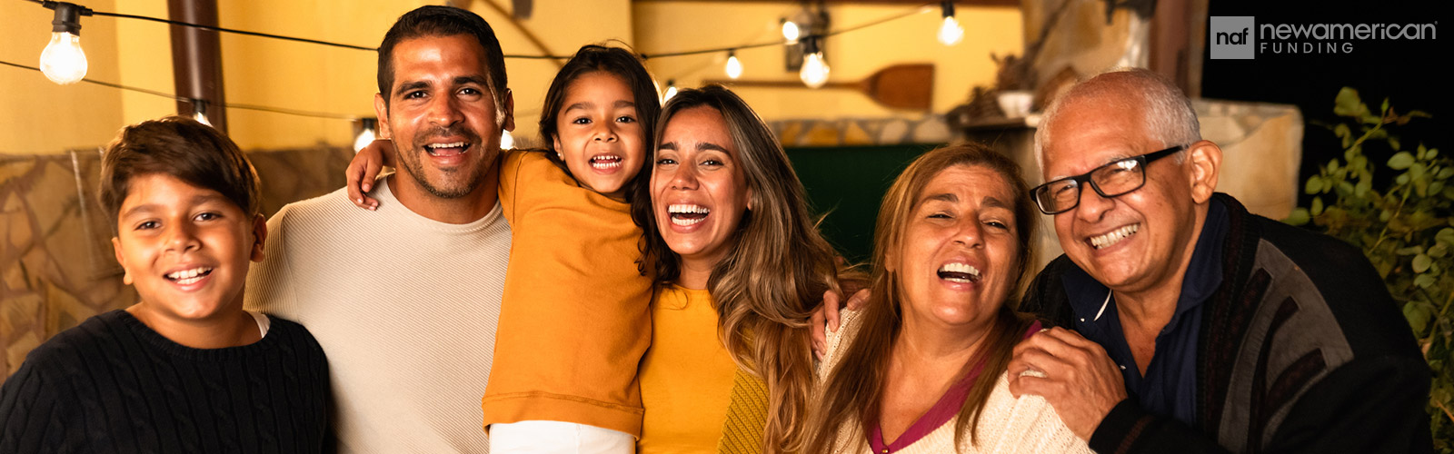 A multi-generational Hispanic family celebrating together 