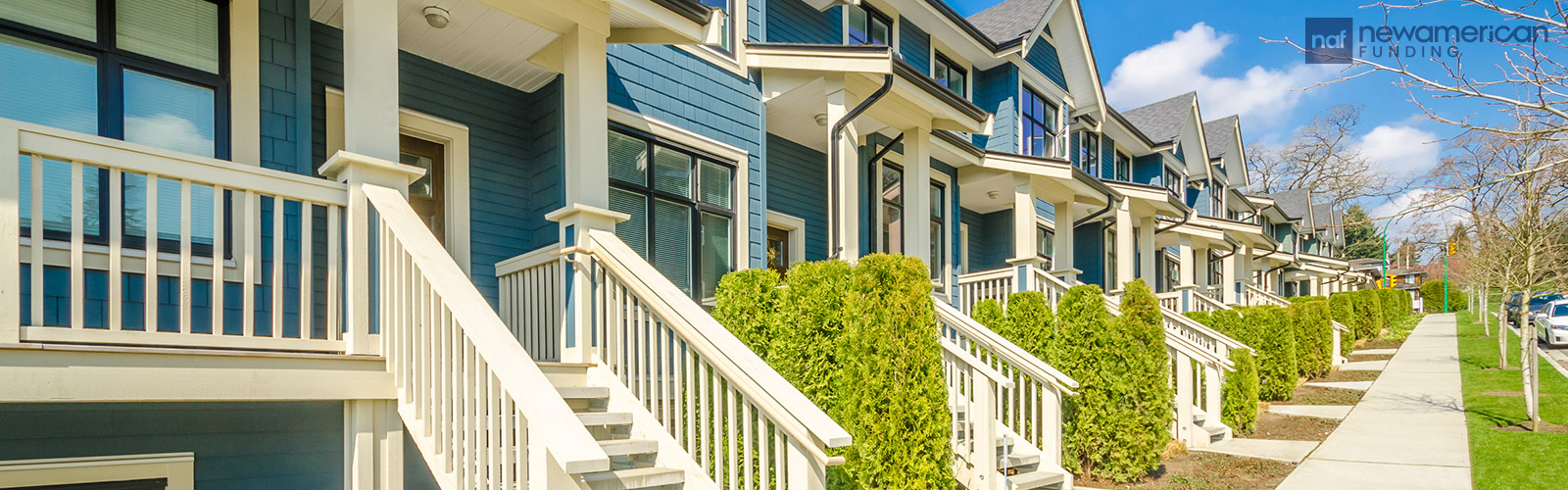 A row of blue townhouses 