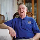 Chisholm, a Knight since 1960, sits at his home in Osage, Iowa. (Photo by Spirit Juice Studios)