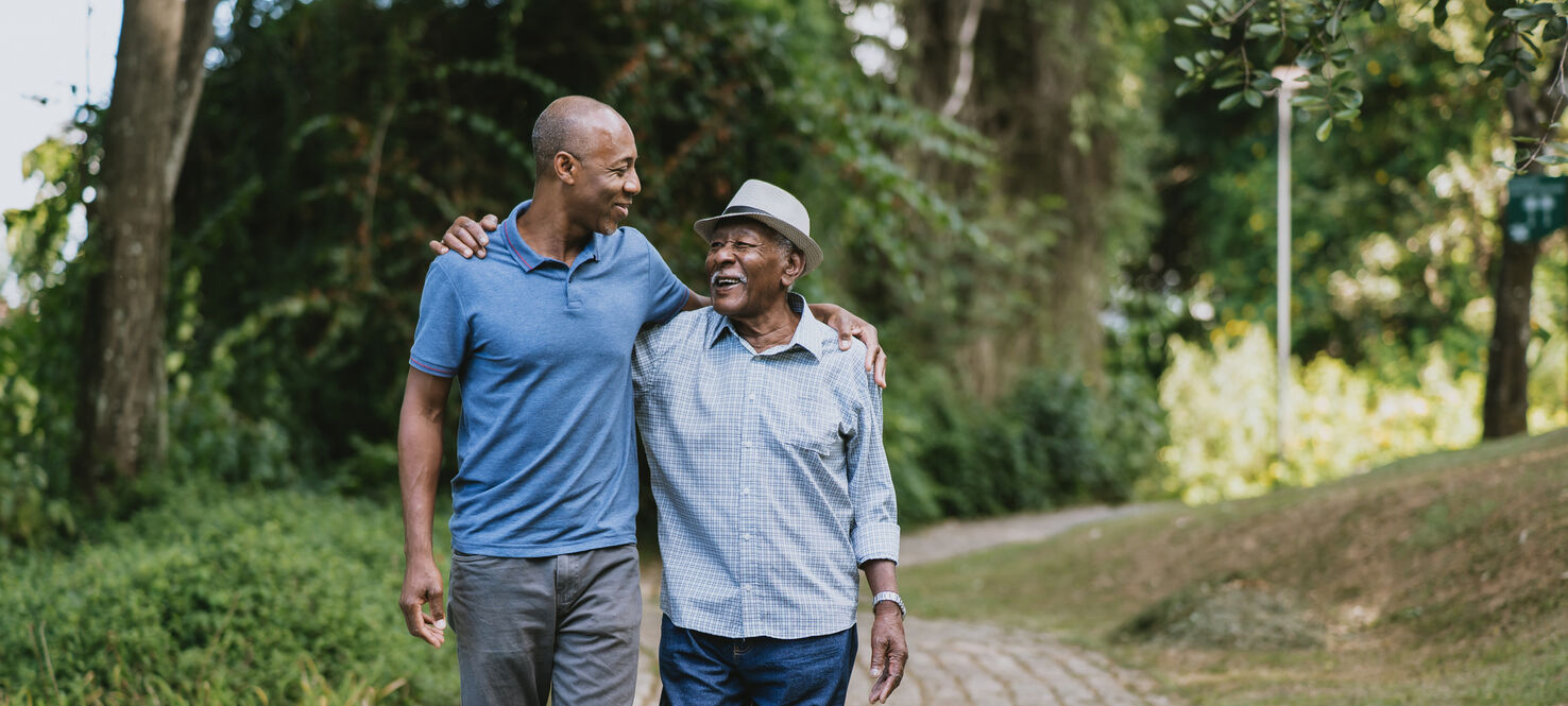 father and son walking on trail