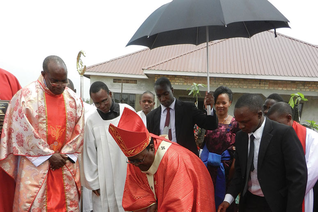  Archbishop Cyprian Kizito Lwanga of Kampala plants a tree