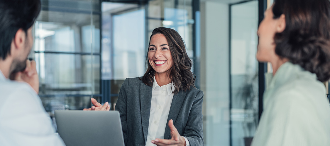 People discussing financial options with an advisor
