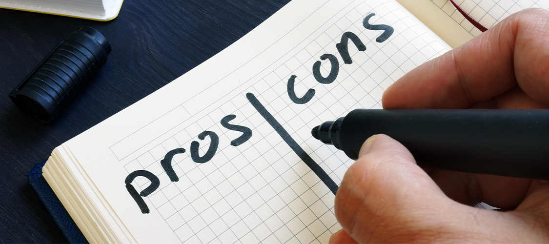 Someone making a list of pros and cons.