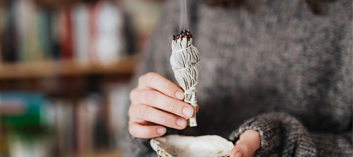 Someone holding sage