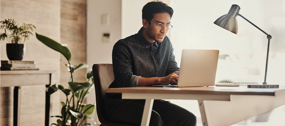 A person at a computer doing research