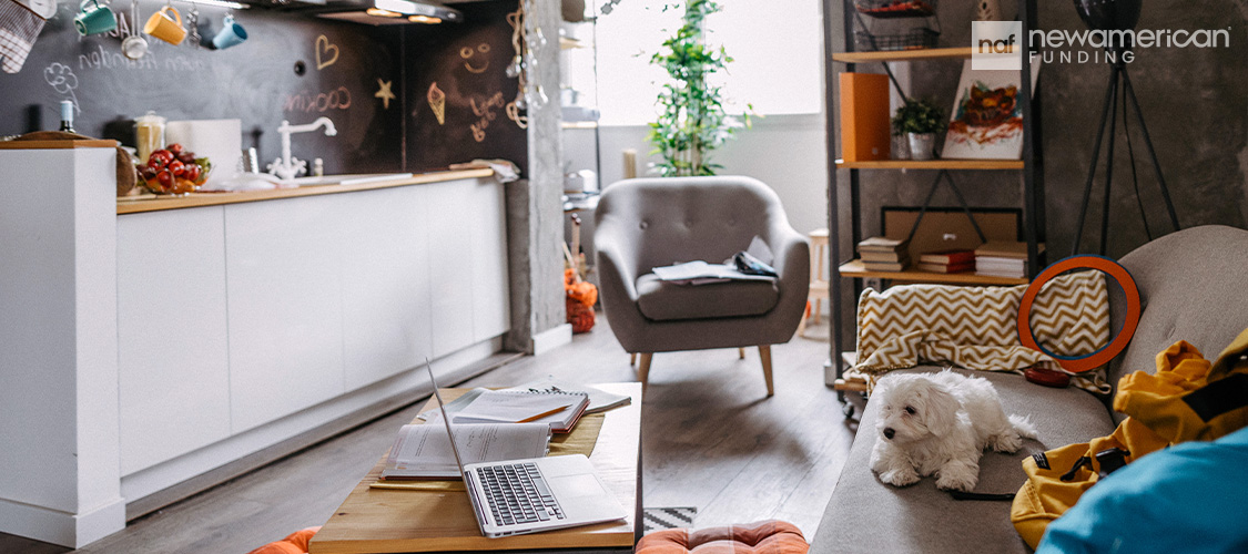 A messy, small living room.