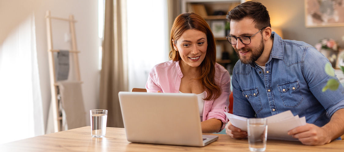 Homebuyers working on a computer