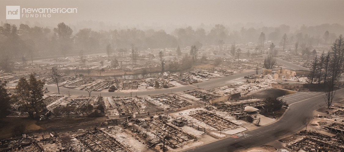 The aftermath of a wildfire in a residential neighborhood.