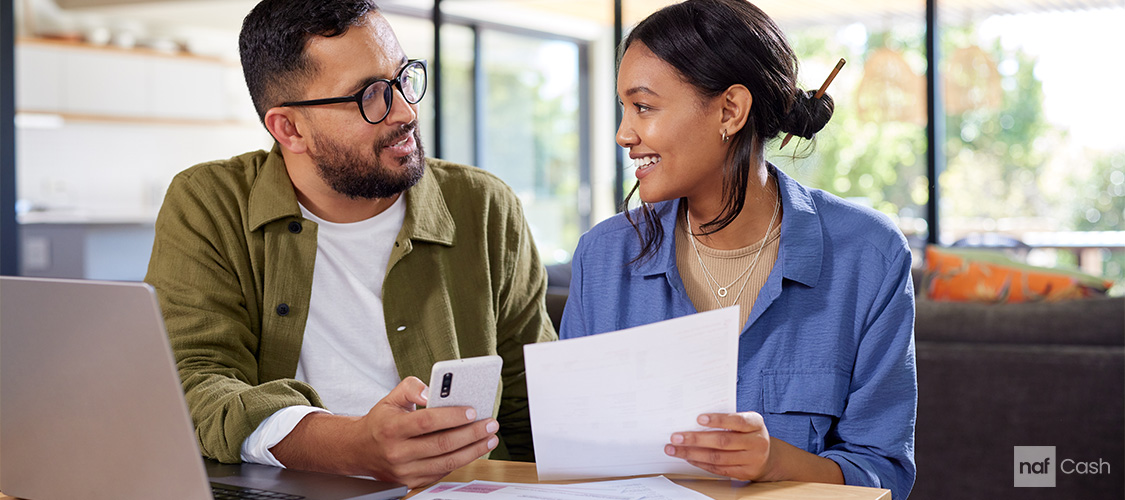Happy couple discussing buying a home