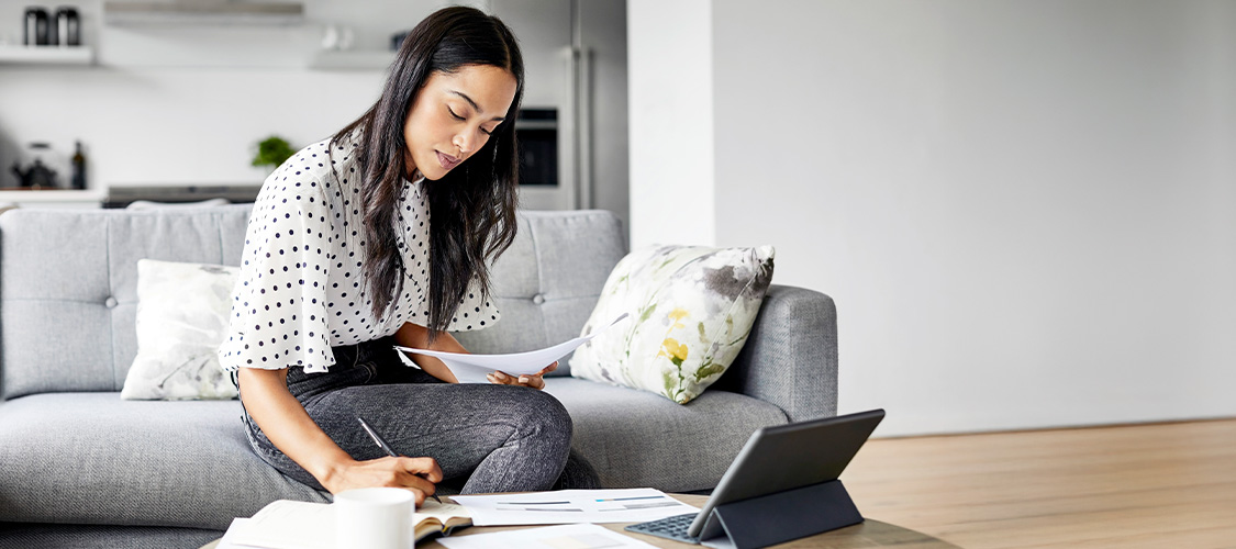 A young woman reviewing her finances