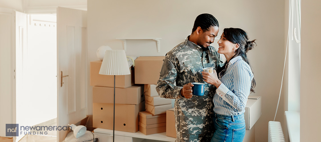 A veteran and their family unpacking in a new home