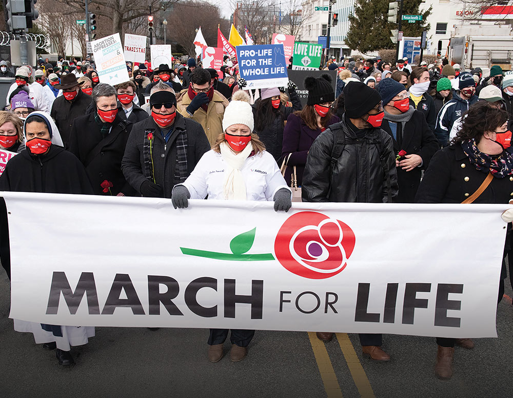 A group of pro-life leaders, including Knights of Columbus, marches to the U.S. Supreme Court building in Washington after the March for Life virtual rally Jan. 29, 2021.