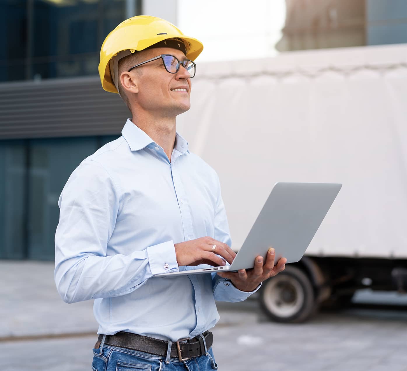 Trucking manager with a laptop