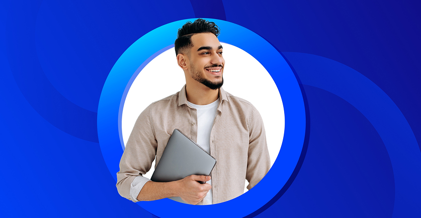 Photo of a smiling young south east asian man with short black hair and a goatie. He is wearing a shirt and t-shirt and is holding a laptop under his arm. Photograph is cropped inside a circle with parts of it sticking out. Circle has a thick bright blue outline, background is bright blue and has decorative circles in the backround that frame the photo