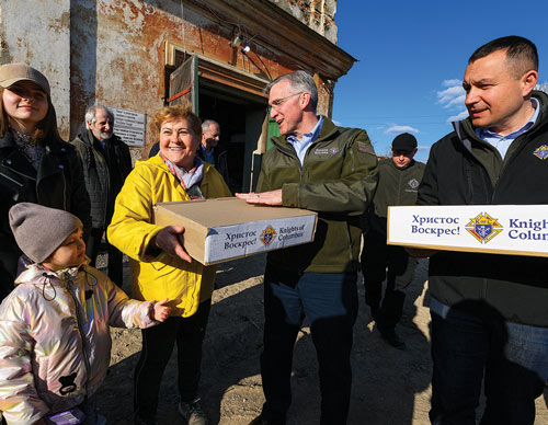 Supreme Knight Patrick Kelly delivers Easter care packages to families taking refuge at a 14th-century monastery in Rava-Ruska, in western Ukraine